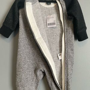 Root’s onesie